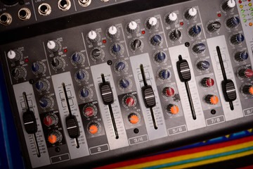 Close-up of modern digital sound mixer in a sound recording studio