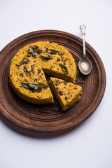 Handvo/handwa is a vegetable cake originating from the Gujarat, India. selective focus