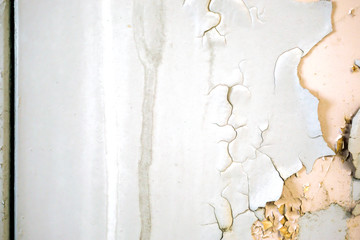 Building wall with peel and cracked color paint background and texture.