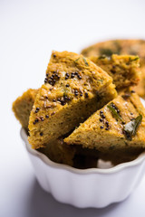Handvo/handwa is a vegetable cake originating from the Gujarat, India. selective focus