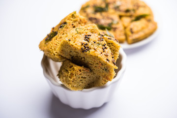 Handvo/handwa is a vegetable cake originating from the Gujarat, India. selective focus