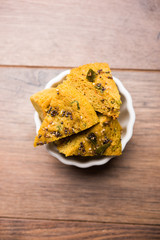 Handvo/handwa is a vegetable cake originating from the Gujarat, India. selective focus