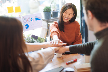 Team bump fists Hands of success startup business teamwork , colleague collaboration teamwork concept