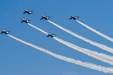 Aerobatics flying with White Smoke by phoenix formation