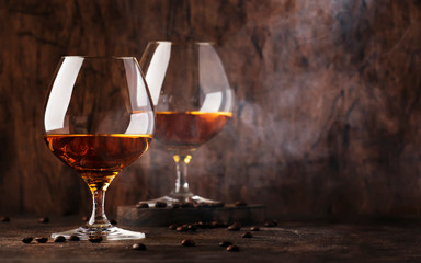 Armagnac, French grape brandy, strong alcoholic drink. Still life in vintage style, selective focus