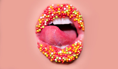 Open mouth with red female lips and tongue. Woman sweets icon isolated on pink skin background. Facial expression concept. Sexy kiss close up. Candy dream.