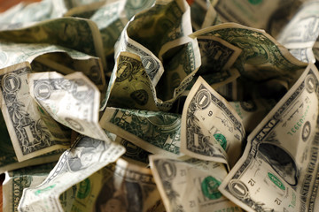 close up wrinkled American one dollar bills pile