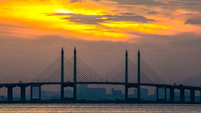 4K Time Lapse view of sunrise from Penang Bridge of George Town