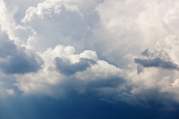 Clouds and bright blue sky background