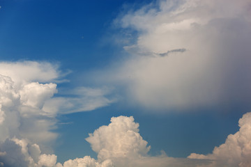 Clouds and bright blue sky background
