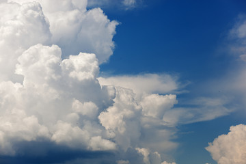 Fototapeta na wymiar Clouds and bright blue sky background