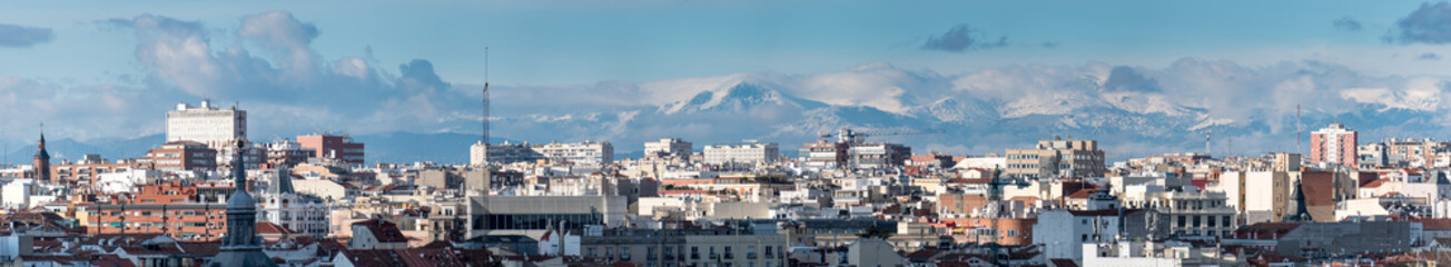 Panoramic of Madrid with the Sistema Central Mountain Range in the background