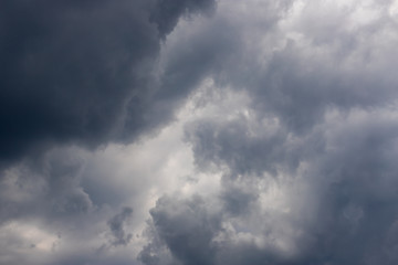 Fototapeta na wymiar Grey clouds against a grey sky.
