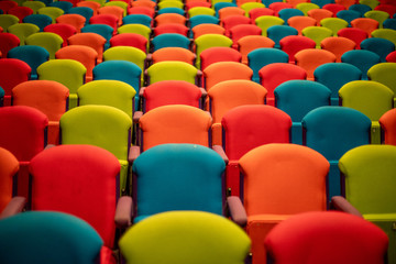 rows of empty colorful seats