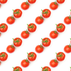Pattern red tomatoes on a green branch on a white background