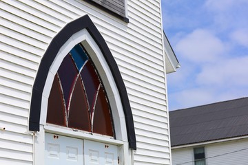Church window on a sunny day, no people.