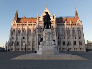Fototapeta premium The Magnificent Hungarian Parliament from outside on a sunny day