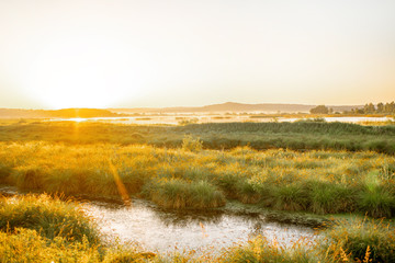 Beautiful landscape view on the lake during the morning light