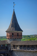 Fototapeta na wymiar Wooden walls and towers of a great medieval fortress of castle. Kamyanets-Podilsky, Ukraine