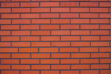 Brick wall is dark orange.