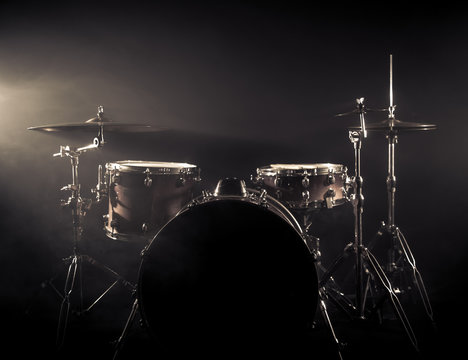 Drum Set On A Stage At Dark Background. Musical Drums Kit On Stage.