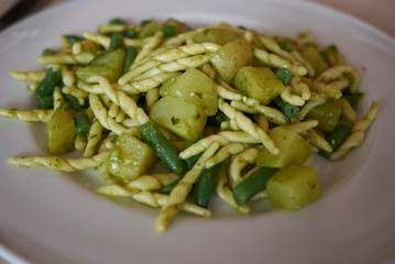 Pasta, called trofie, with italian pesto