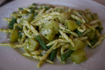 Pasta, called trofie, with italian pesto