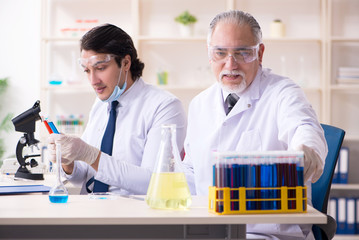 Two chemists working in the lab 