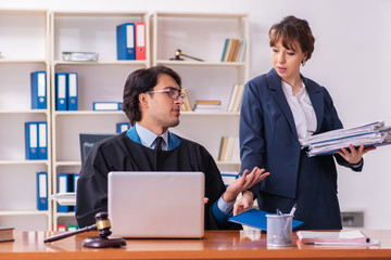 Two lawyers working in the office