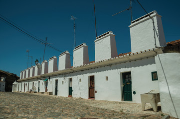 Fototapeta na wymiar Terraced houses with large chimney