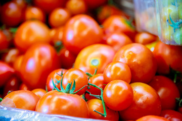 Tomatoes at the market display stall