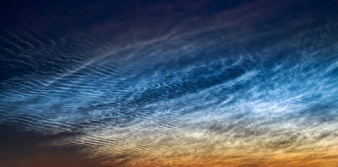  Noctilucent clouds, June 21, 2019, Rhineland Germany, night shining ice clouds glow in a dark sky after sunset, the highest clouds in the Earth’s mesosphere, a beautiful atmospheric phenomenon
