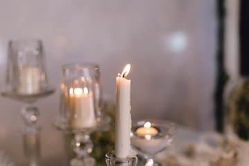 yellow light white candles and candles