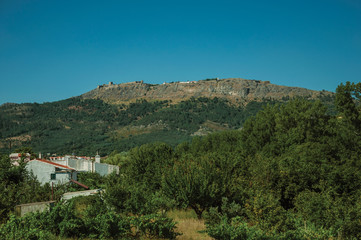 Fototapeta na wymiar Marvao village on top of crag with stone walls and towers