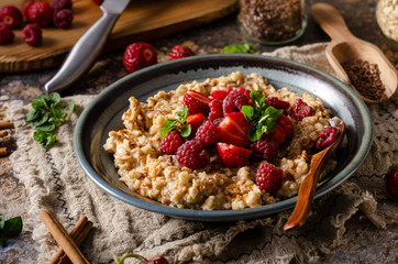 Homemade porridge with forest berries