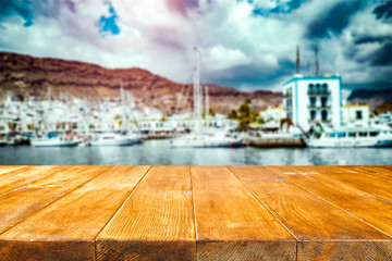 Desk of free space and summer background of beach 