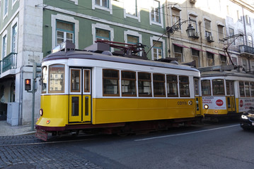 Naklejka na ściany i meble Portugal Lisbon yellow tram landscape