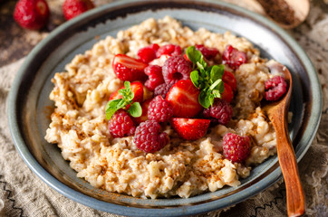 Homemade porridge with forest berries