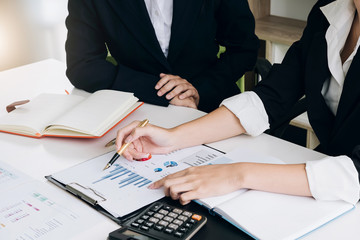 Group of business people busy discussing financial matter during meeting. Corporate Organization Meeting Concept