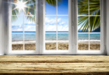Desk of free space and summer background 