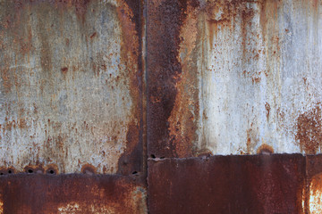 Bright rust stains texture paint showing through to rust underneath