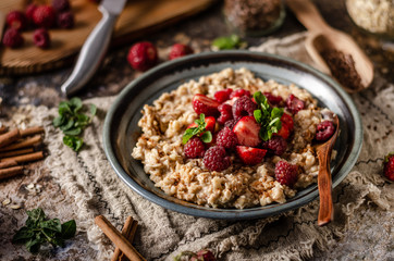Homemade porridge with forest berries