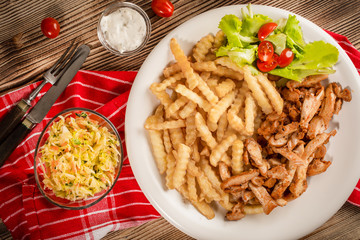 Greek gyros dis with fries and salad