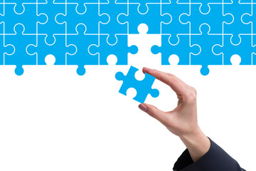Concept of businessman with missing jigsaw puzzle piece