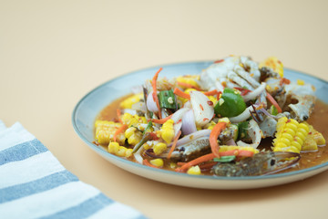 Raw fresh blue swimming crab spicy salad mix with corn