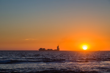 Fototapeta na wymiar Sunset on the Atlantic coast at Porto