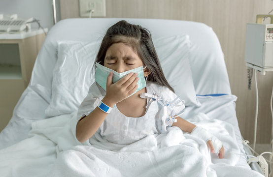 Patient Asian Kid Coughing With Mask On Hospital