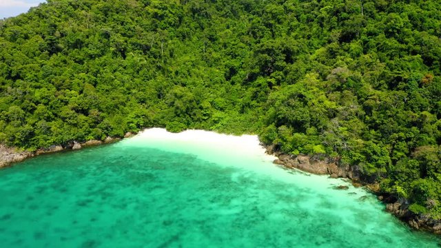 Aerial view from a drone of beautiful Nyaung Oo Phee island on sunny day in Myanmar