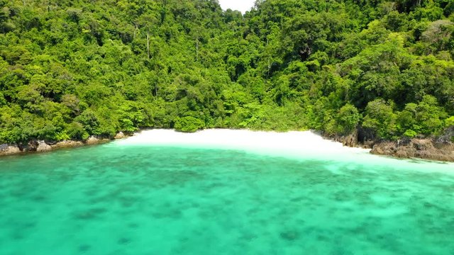 Aerial view from a drone of beautiful Nyaung Oo Phee island on sunny day in Myanmar