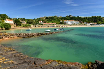 Foto op Canvas St Brelades Bay, Jersey, U.K. Famous beach and harbour of the island in the Summer. © alagz